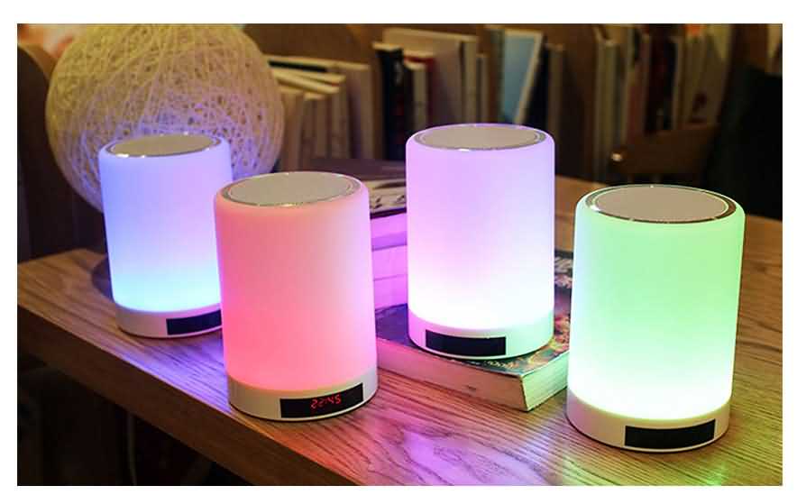 Led speaker beside lamps